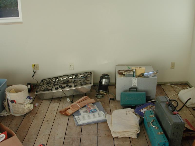 12/10 - Forlorn appliances on the floor of the den