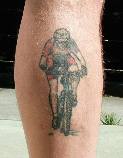 me and my mountain bike, on the outside of my right calf